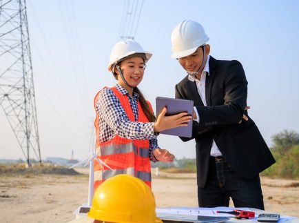 Outdoor consultation between engineers on site